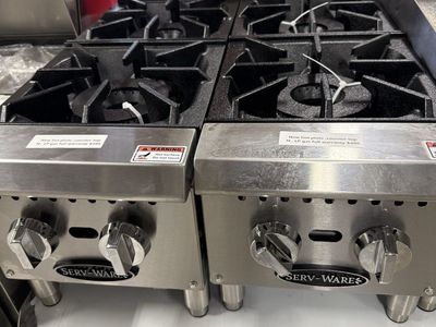 New 2 burner hot plate natural or propane gas , one year manufacture warranty