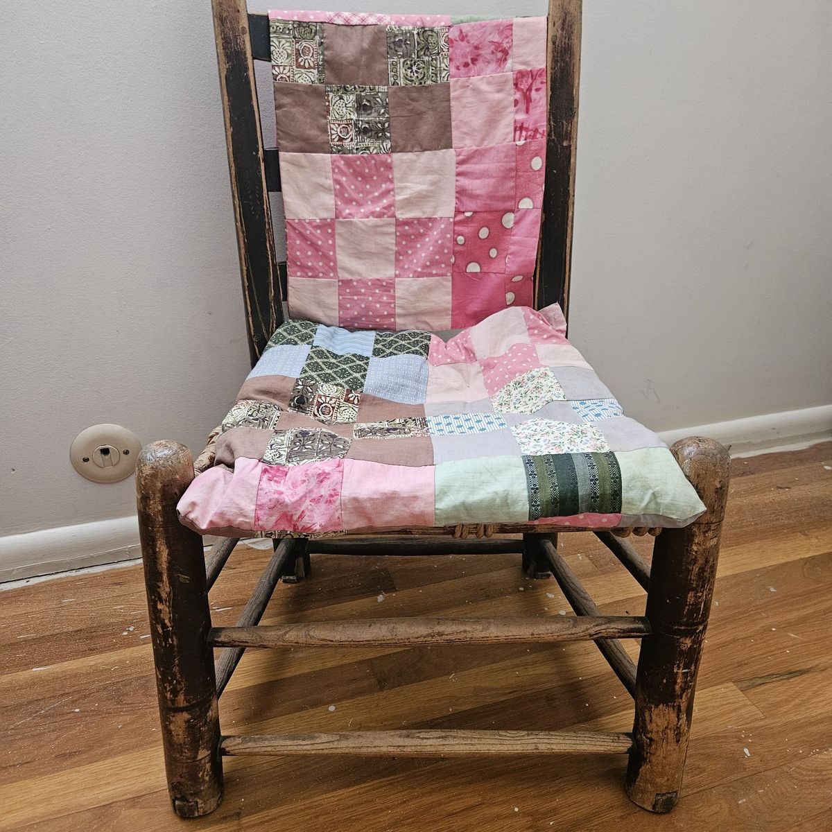 Antique rope chair with quilting