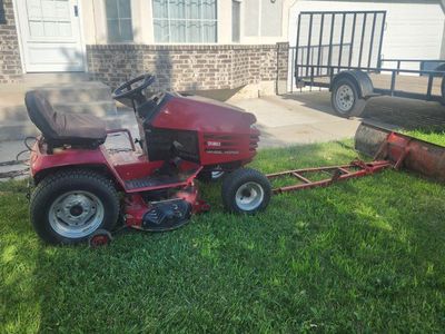 Toro Wheel Horse 264-H Riding Lawn Mower with Plow Attachment & Tire Chains