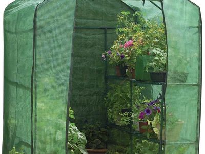 Portable Greenhouse with shelving, 75" long x 49" wide x 75" High