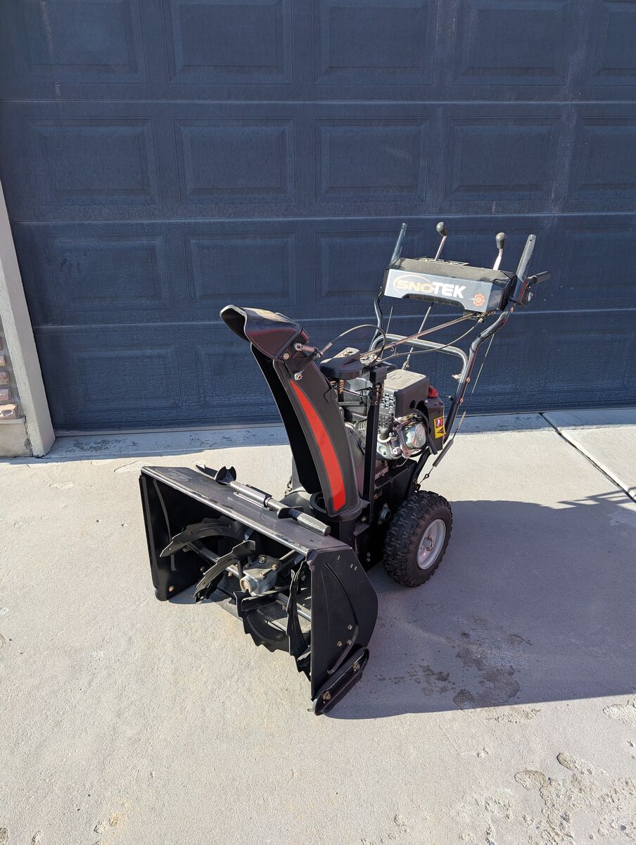 Used Sno-Tek snow blower with electric start