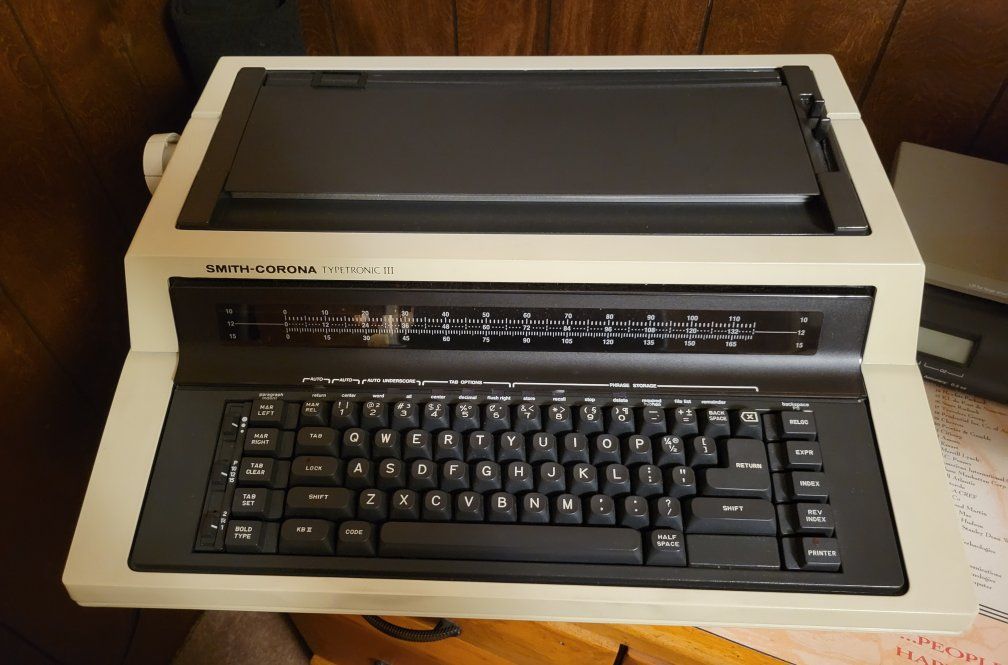Smith-Corona Typetronic III Electronic Typewriter with Original Cover and Manual