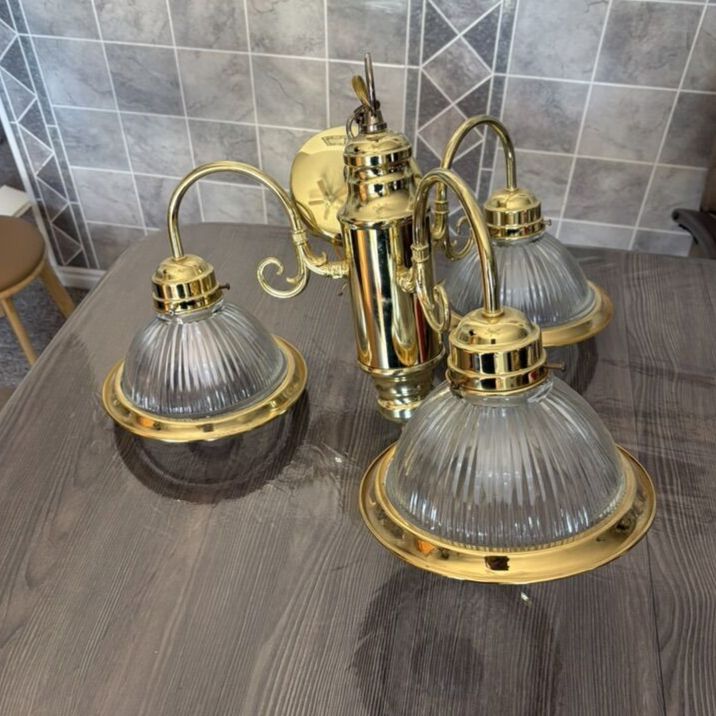 Golden Colored Chandelier With Three Lights