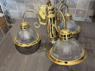 Golden Colored Chandelier With Three Lights