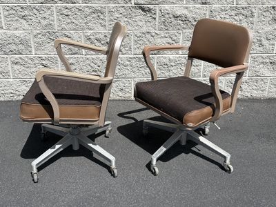 Vintage Mid Century rolling desk armchairs. Swivel and rocking. Made in USA by Steelcase. Mid century modern MCM
