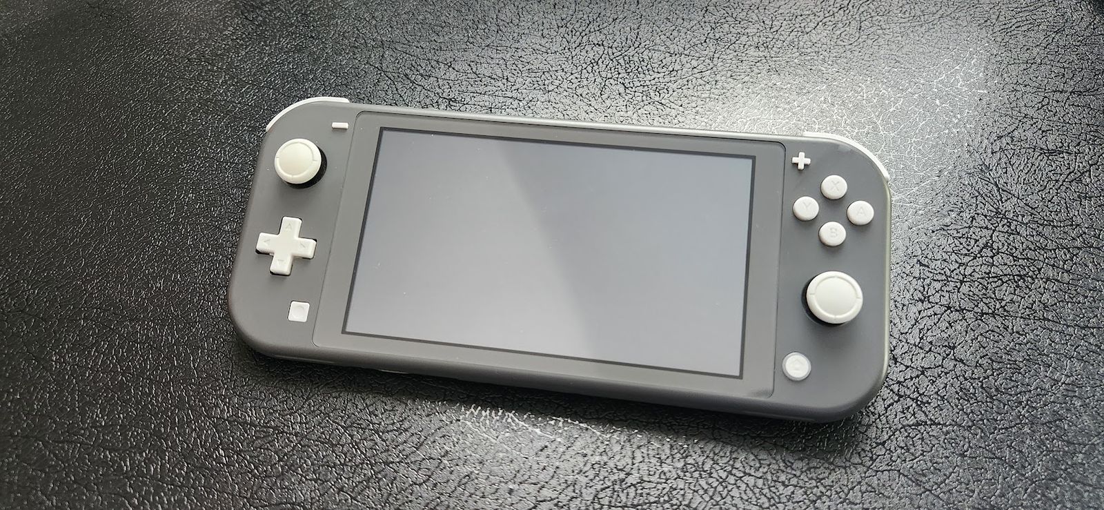 Nintendo Switch Lite Gray + Charger + 128GB SD Card