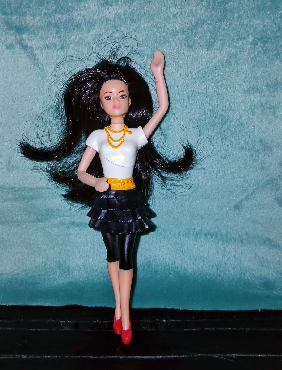 A 2014 Mattel McDonald's happy meal toy Raquelle from the web series of Barbie Life In The Dreamhouse Fashion Doll .