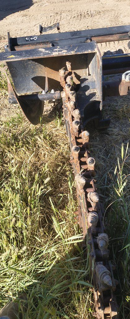 trencher attachment for a skidster