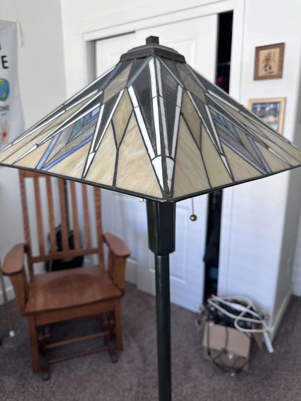 Maybeck Floor Lamp in a valiant bronze finish and Tiffany glass shade design