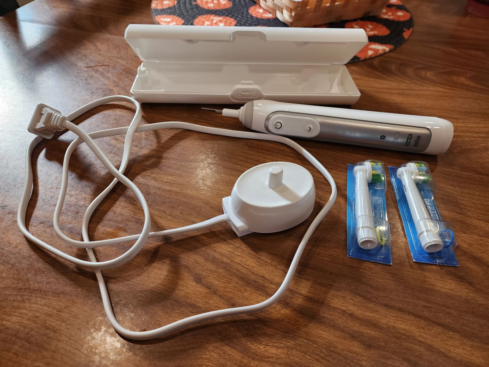 Gently used (and deep cleaned) Oral-B Genius 6000-8000 electric toothbrush set