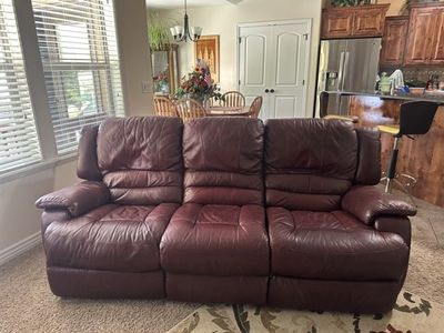 Leather rocking/reclining sofa