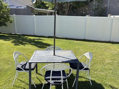 Darling Patio Set! Table, 4 Vintage Vibe Chairs, Umbrella And Stand.