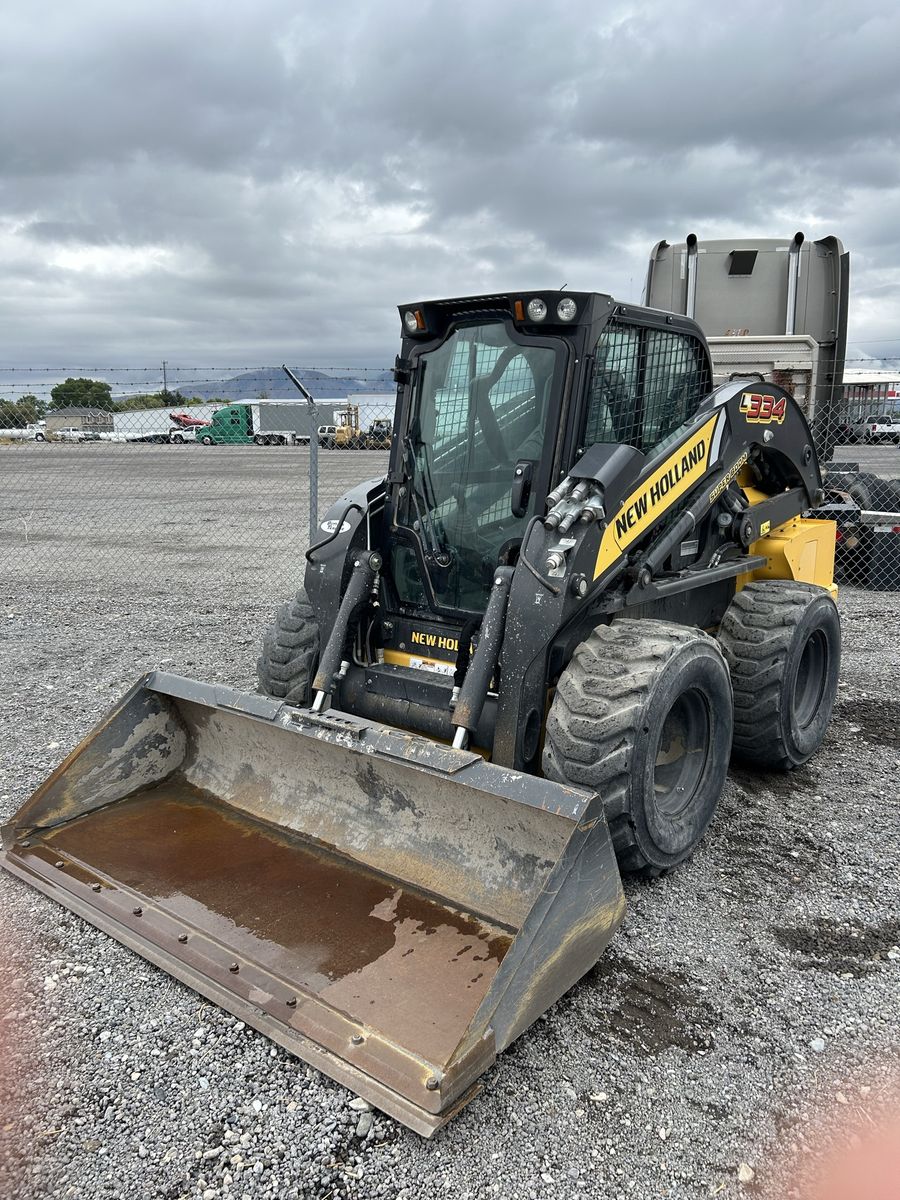 Used 2020 New Holland L334 Super Boom Skid Steer Loader with Enclosed Cab and Bucket