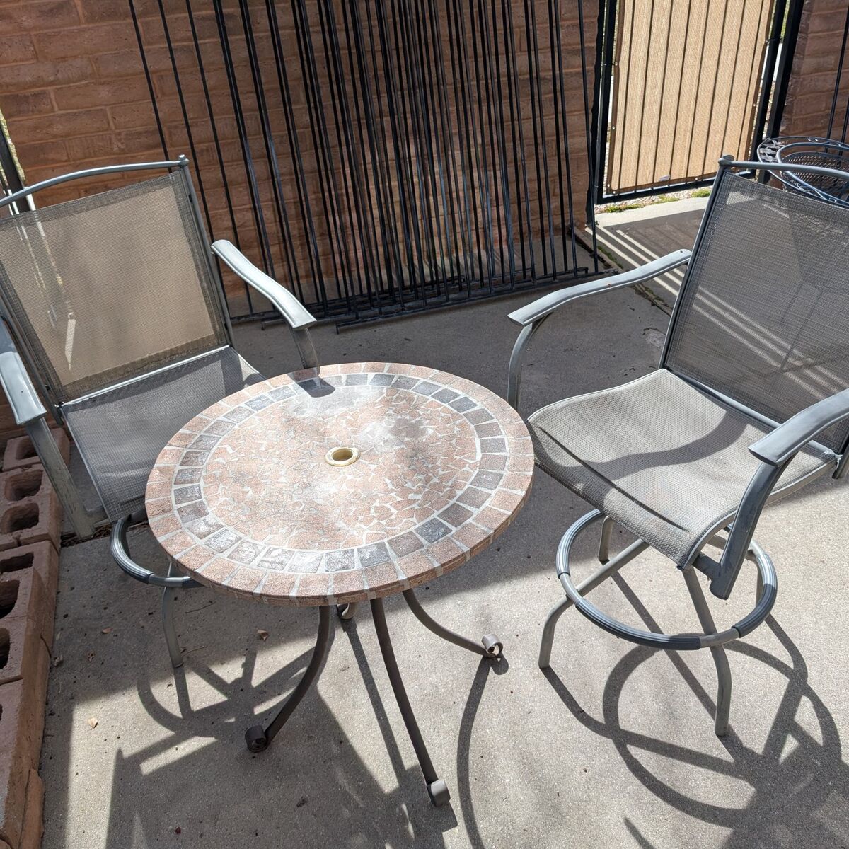 small patio table with 2 chairs