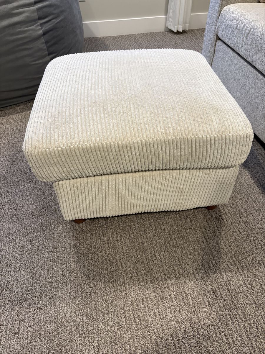 Cream colored ottoman