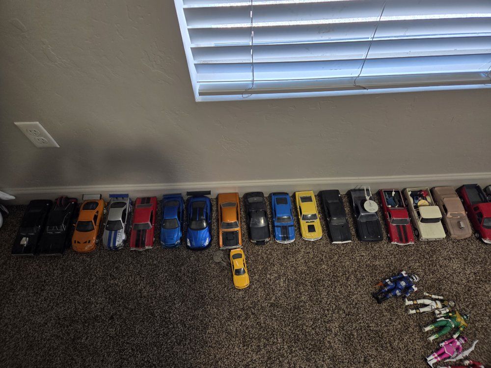 Large Collection of Action Figures: Power Rangers, Transformers, Gundam, and Halo Master Chief