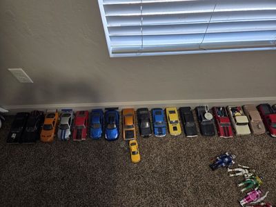 Large Collection of Action Figures: Power Rangers, Transformers, Gundam, and Halo Master Chief