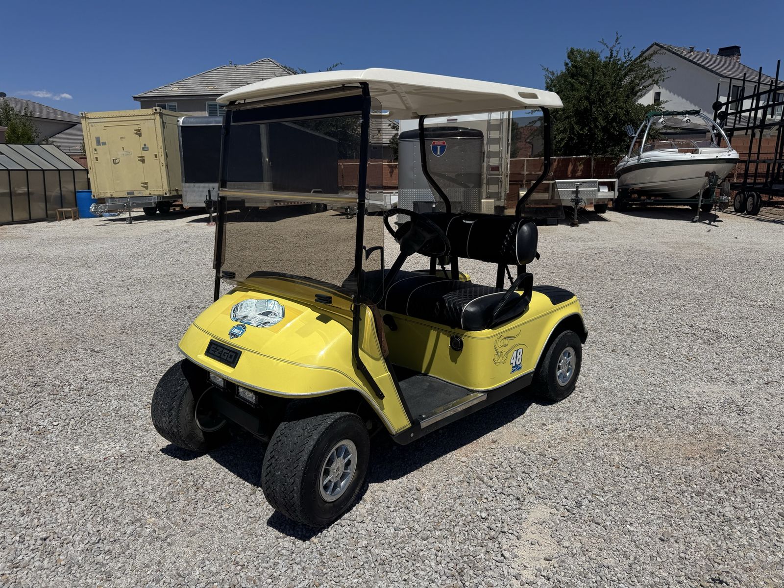 EZGO Yellow Golf Cart with new seats and Windshield LITHIUM - CAN DELIVER