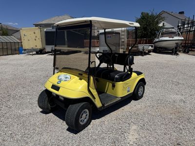 EZGO Yellow Golf Cart with new seats and Windshield LITHIUM - CAN DELIVER