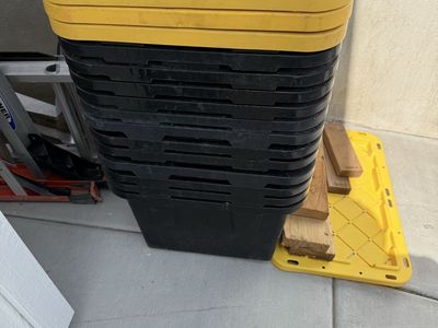 Stack of Greenmade Black and Yellow Plastic Storage Totes with Lids