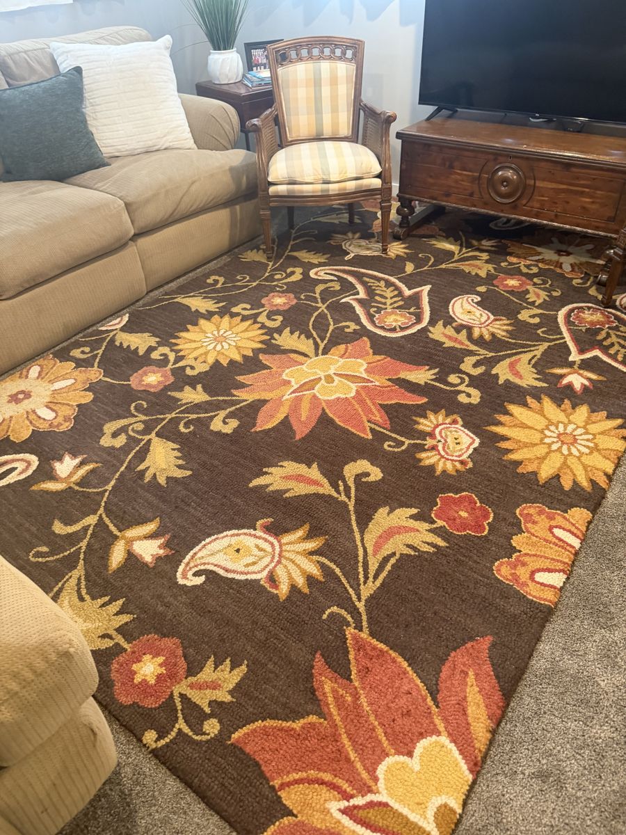 Large multi colored area rug.