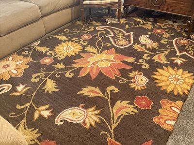 Large multi colored area rug.