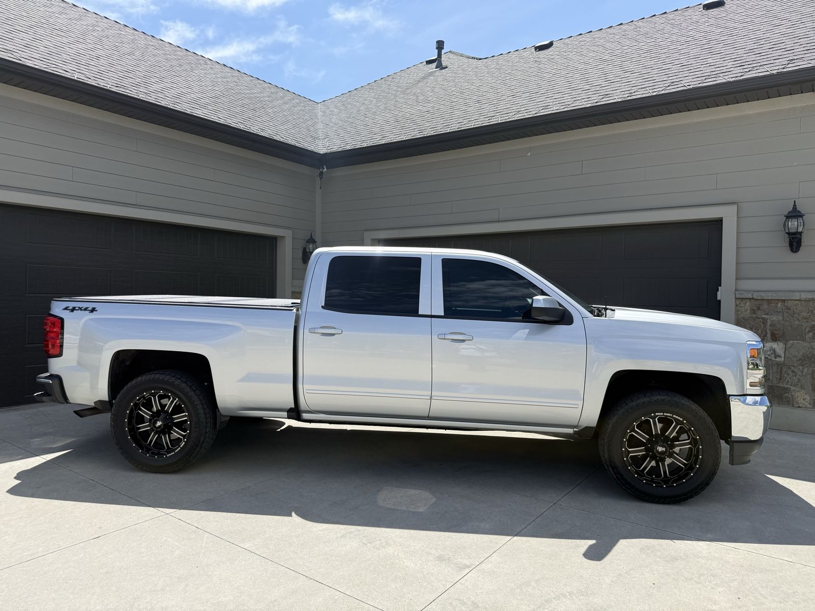ISO 33x12.5r20 or 305/55r20 tires with 20x12 wheels 6x5.5" (6x139.7mm) lug pattern for trade.