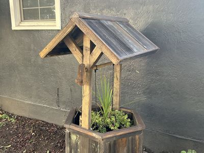 Homemade wooden wishing well