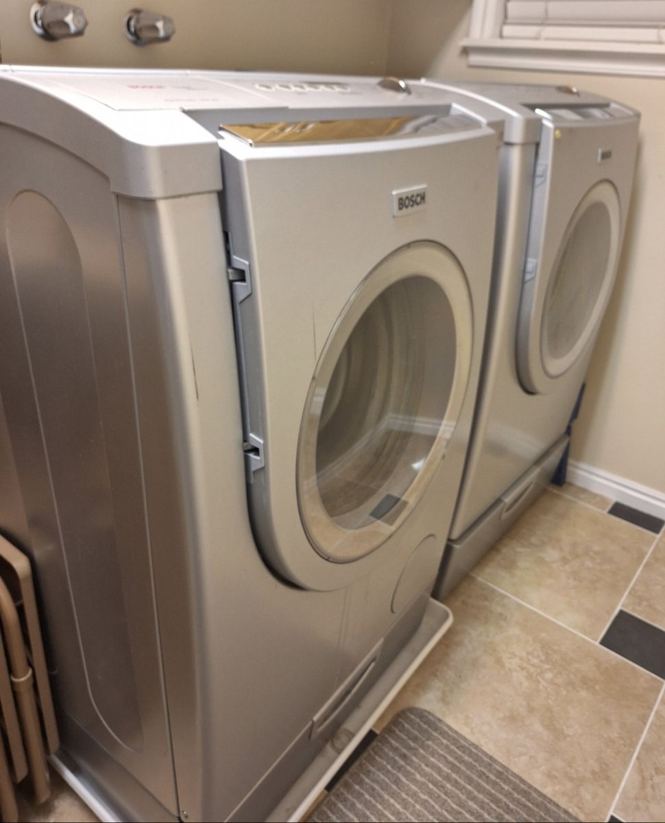 Used Electric Bosch Front-Load Washer and Dryer.