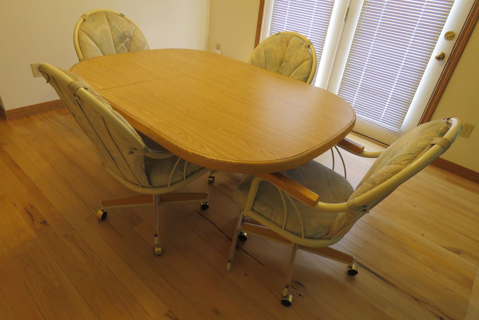 Kitchen/ Dining Table and 4 Chairs that Roll, Swivel, and Rock