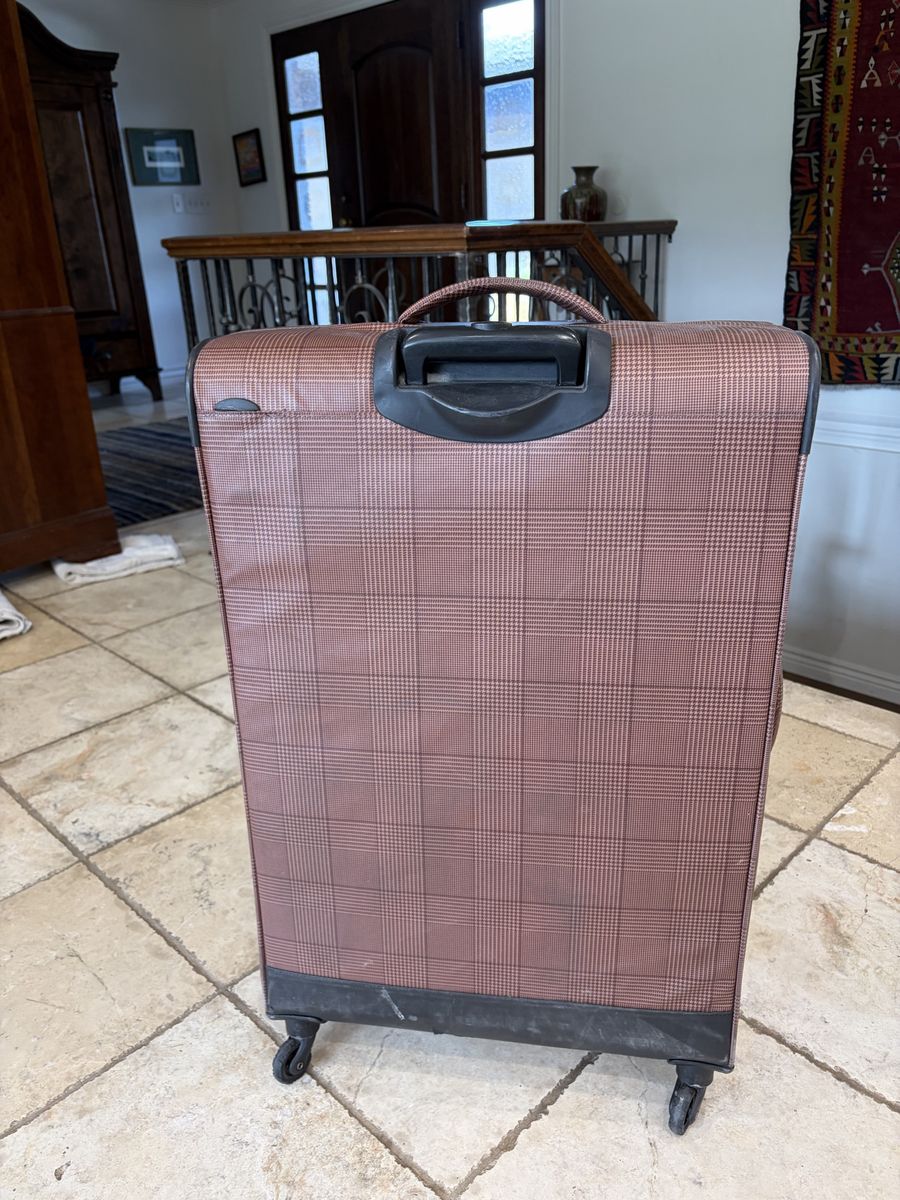 28” Weatherproof Rolling Suitcase – $25