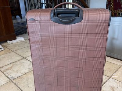 28” Weatherproof Rolling Suitcase – $25