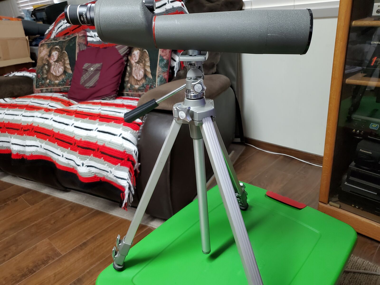 Bushnell 20x to 45x power spotting scope with tripod.