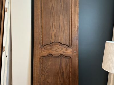 Quality solid wood interior doors removed during a remodel. These are not hollow-core or MDF—they are solid wood construction.