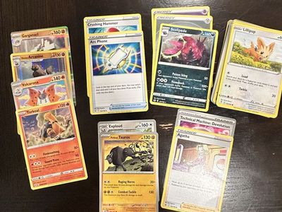 Assorted Pokémon TCG Cards Lot - Includes Trainers, & Energy Cards