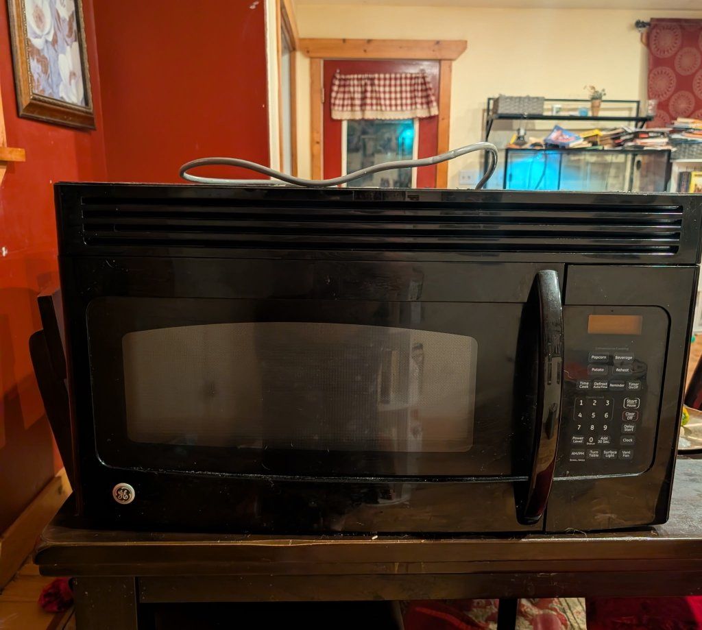 GE Over-the-Range Black Microwave Oven