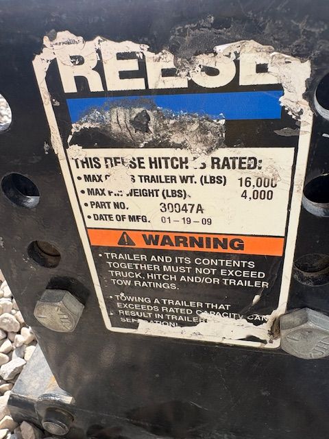 Fifth wheel hitch and trail gate