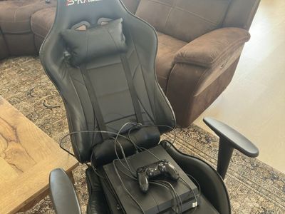 PS4 bundle with gaming chair and one controller