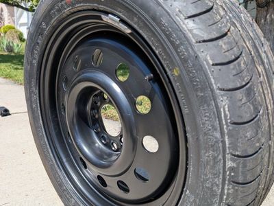 Never-used full-size spare tire (205/55R16)