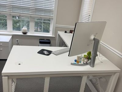 White Modern L-Shaped Executive Office Desk with Mesh Panels and Cable Grommets