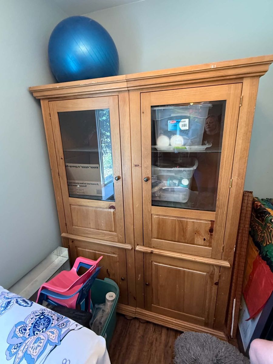 Vintage armoire with glass doors