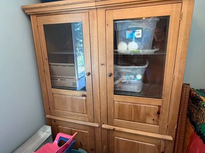 Vintage armoire with glass doors