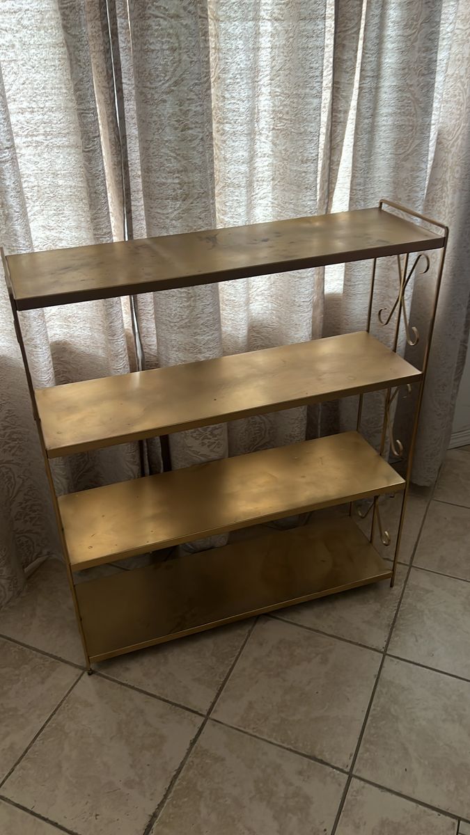 Gold Mid Century metal shelf for purse or vanity display