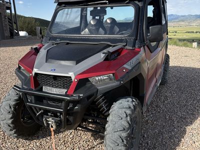 Polaris General 1000 Deluxe UTV - Red 4-Seater Utility Vehicle with Full Enclosure