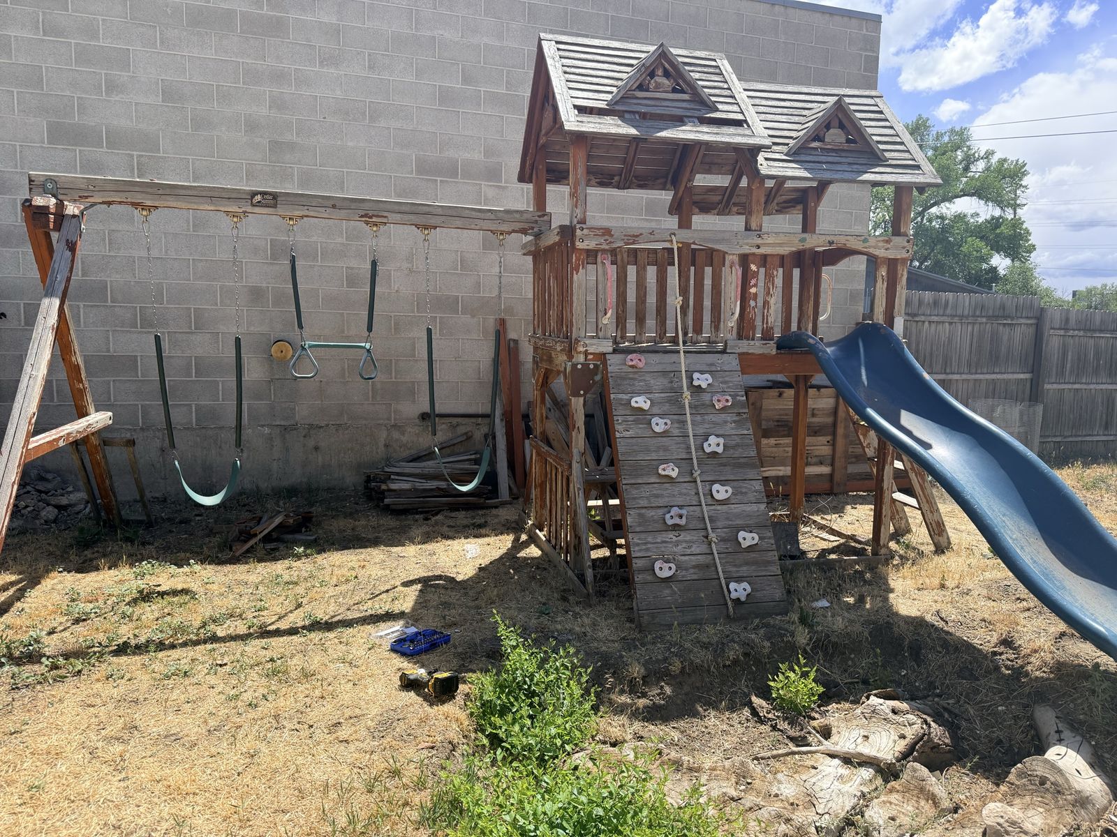 Kids Wooden Playset with Swings, Slide, and Climbing Wall - Outdoor Backyard Fun
