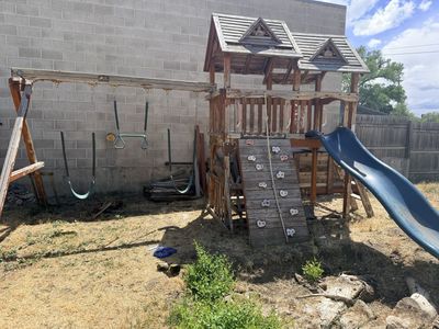 Kids Wooden Playset with Swings, Slide, and Climbing Wall - Outdoor Backyard Fun