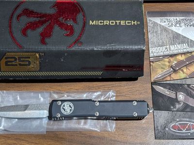 New, never carried, 25th anniversary edition Microtech Ultratech OTF