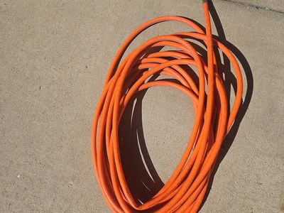 Lightly used 3/8” x 50’ PVC Air hose; 300 PSI max…