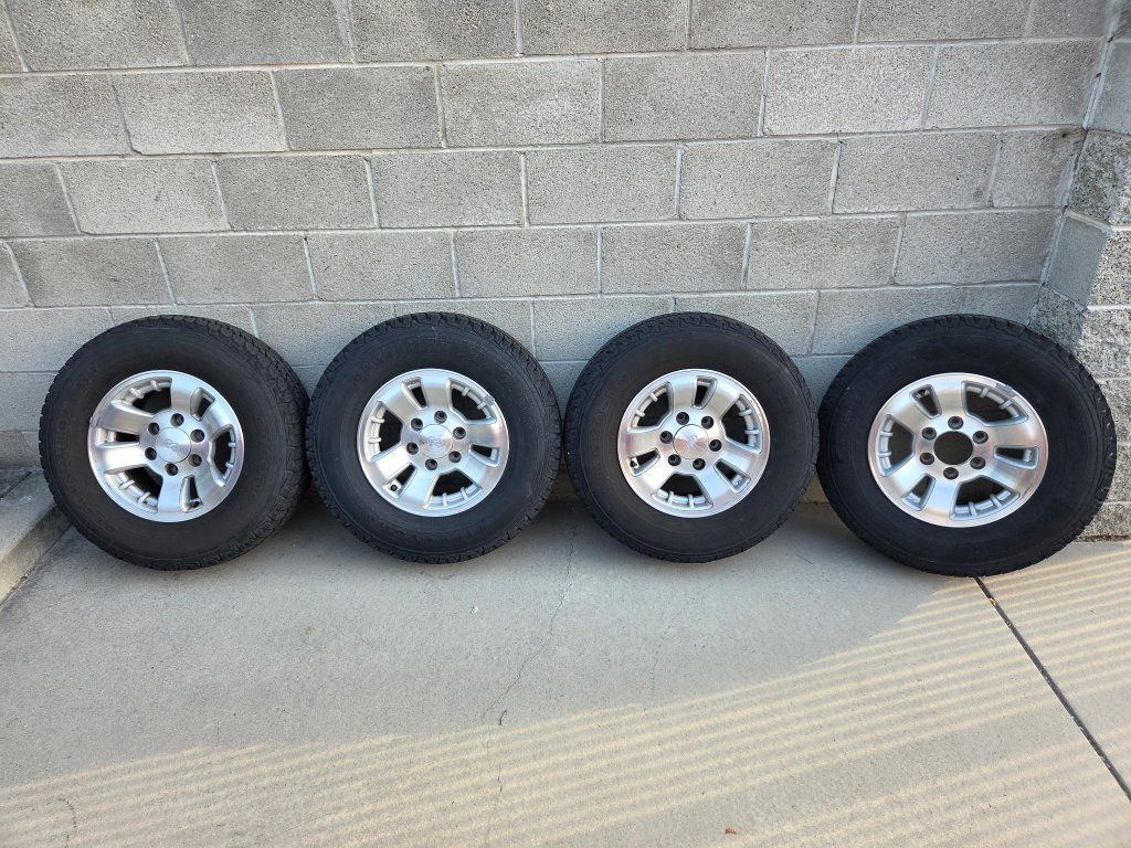 Set of 4 Toyota Wheels  with  Tires - Good Tread, Used Condition