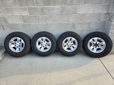 Set of 4 Toyota Wheels with Tires - Good Tread, Used Condition